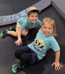 Campers bonding and playing together indoors during Camp Shemeshaz social activities